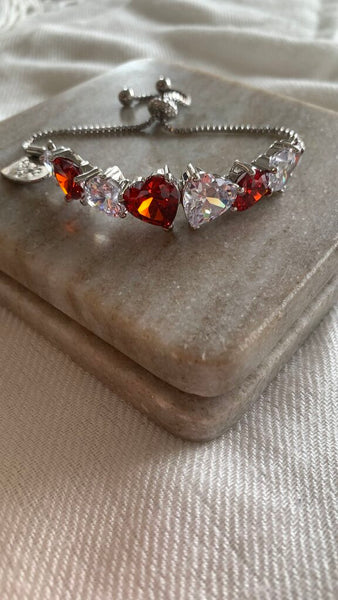 Pre-Owned Fifth Avenue Silver w/ Red/Clear Heart Stone Adjustable Bracelet